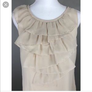 Cabi Women’s sleeveless cream blouse.